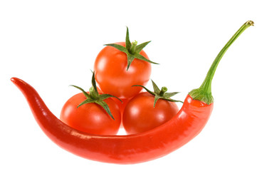 fresh tomatoes with red chili pepper isolated on white background