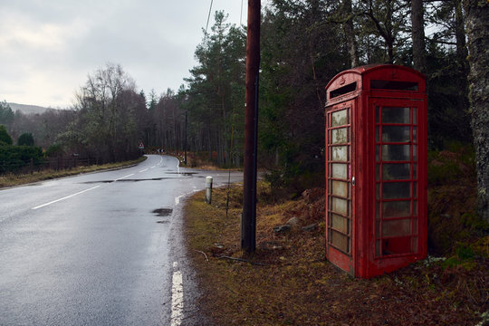 a telephone booth on the side of the road, Scotland