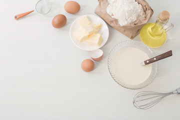 dough in glass plate and products for its preparation on  white