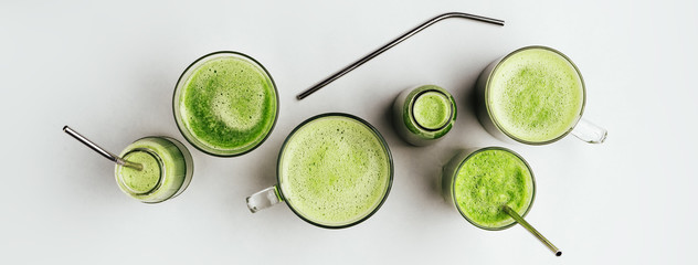 Cucumber vegan smoothie in many glasses, nutrient hydrating green juice, detox food, weight loss...