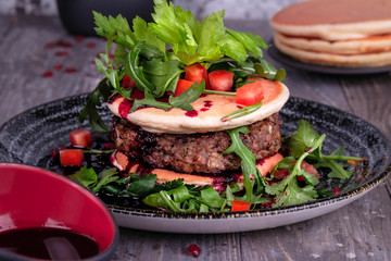 pancakes with beef and greens