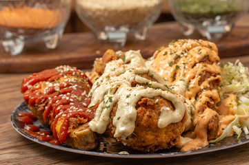 Crispy Fried chicken with sauces and spices 