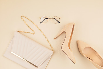 Flat lay with woman fashion accessories in yellow and blue colors. Fashion blog, summer style, shopping and trends idea
