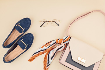 Flat lay with woman fashion accessories in beige and blue colors. Fashion blog, summer style,...