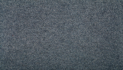 Carpet covering background. Pattern and texture of gray colour carpet. Copy space