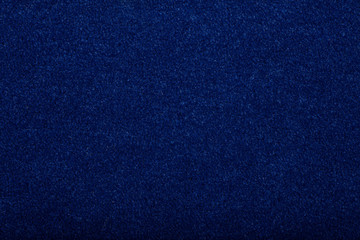 Carpet covering background. Pattern and texture of blue colour carpet. Copy space