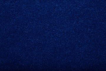 Carpet covering background. Pattern and texture of blue colour carpet. Copy space