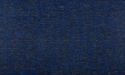 Carpet covering background. Pattern and texture of blue colour carpet. Copy space