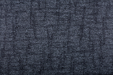 Carpet covering background. Pattern and texture of black colour carpet. Copy space