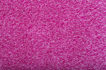 Carpet covering background. Pattern and texture of pink colour carpet. Copy space