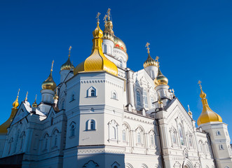 Fototapeta na wymiar golden domes of Pochaiv Lavra