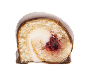 Sliced chocolate swiss roll with berry jam and butter cream isolated on white background
