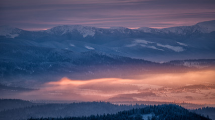 Inversion in the mountains. Gorgany seen from the Tarnica Mt in Poland. Carpathian Mountains.