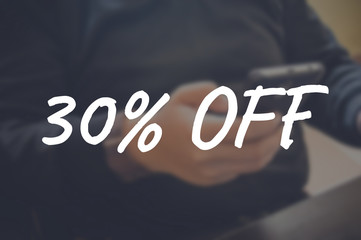 30% off word with blurring business background