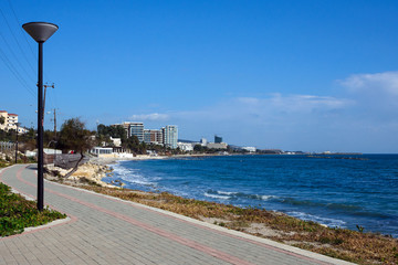 Turquoise sea and coastline on a bright sunny day. Travel to the island of Cyprus, Limassol.