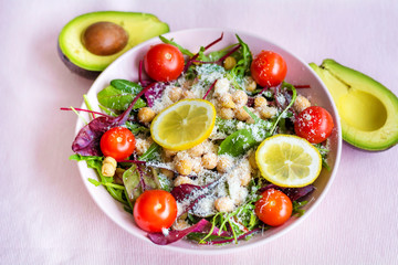 Avocado Salad with Cherry Tomatoes and Baby Spinach  .Healthy Food