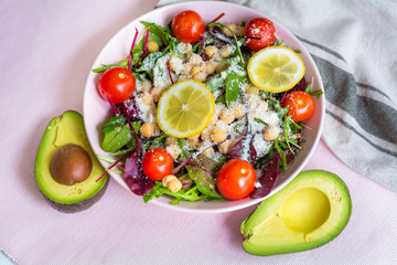 Avocado Salad with Cherry Tomatoes and Baby Spinach  .Healthy Food