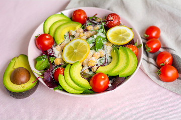 Avocado Salad with Cherry Tomatoes and Baby Spinach  .Healthy Food