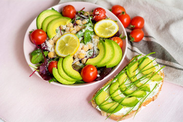 Avocado Salad with Cherry Tomatoes and Baby Spinach and Sandwich .Healthy Food