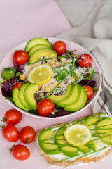 Avocado Salad with Cherry Tomatoes and Baby Spinach  .Healthy Food