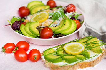 Avocado Salad with Cherry Tomatoes and Baby Spinach and Sandwich .Healthy Food