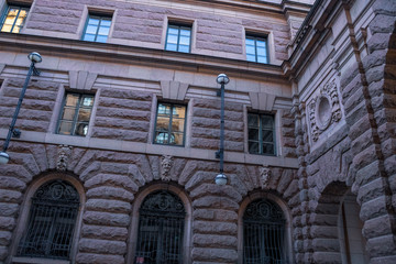 The facade is made in Gothic style, with decorations in the form of faces; Human faces made as decorations to the general facade of the palace in Sweden