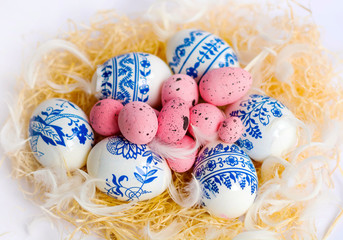 Easter Eggs with Blue Decoration Elements and Feathers .Easter Decoration 