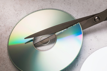 Scissors cut cd. Information destruction concept
