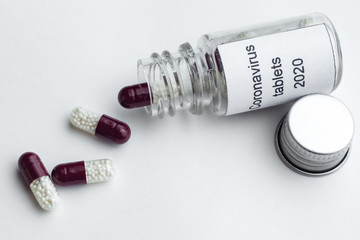 coronavirus tablets from coronavirus pharmaceuticals antibiotics medicine tablets /colorful antibacterial tablets on white background /medicine capsule tablets