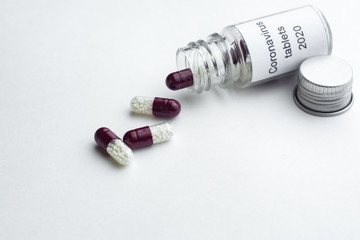 coronavirus tablets from coronavirus pharmaceuticals antibiotics medicine tablets /colorful antibacterial tablets on white background /medicine capsule tablets