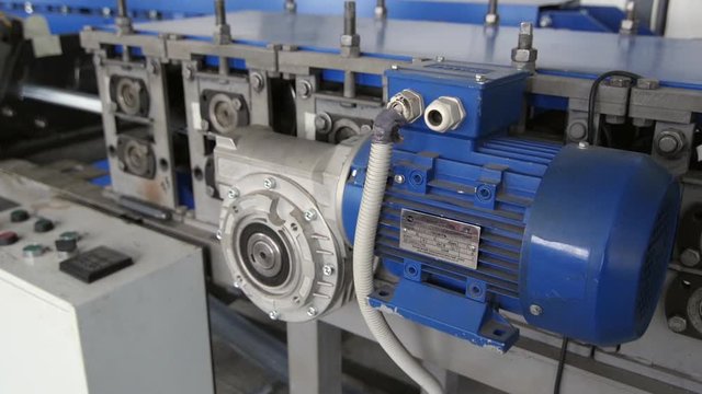 " The induction motor on the machine. With the reducer. Color blue"