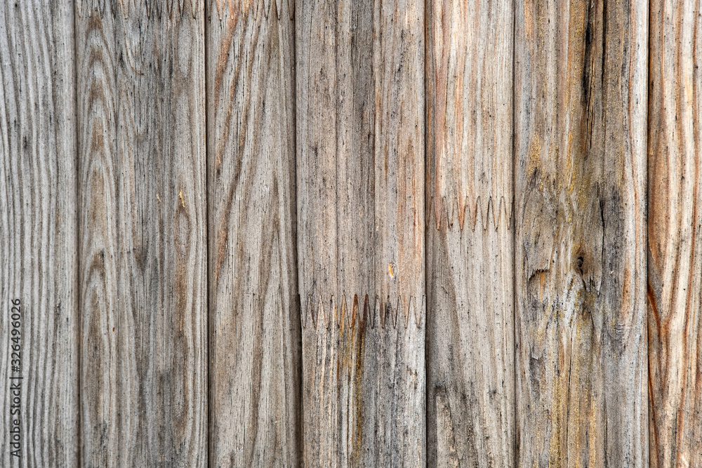 Wall mural Closeup surface of old weathered wooden boards.