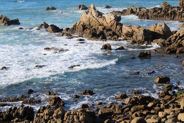 waves crashing on rocks