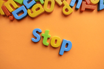 Stop concept, with colorful letters.