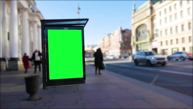 Billboard green screen on a big city street