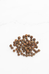 Black peppercorns, isolated on white background. black pepper, black peppercorn. elevated top view, directly above. . Cooking, spices and kitchen concept.