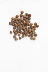 Black peppercorns, isolated on white background. black pepper, black peppercorn. elevated top view, directly above. . Cooking, spices and kitchen concept.
