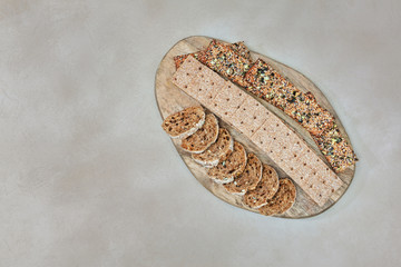thin slices of rye bread with seeds and slices of baguette