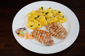 pork barbecue with nature potatoes and salad