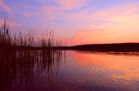 sunset on lake © Pavlo Klymenko