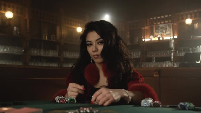 female poker player in bar