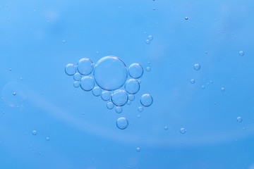 Blue abstract background with group of bubbles close up - banner background