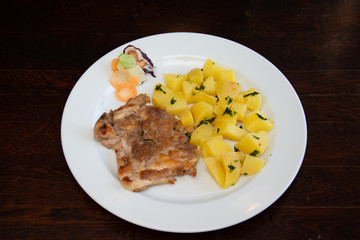 grilled pork and boiled potatoes