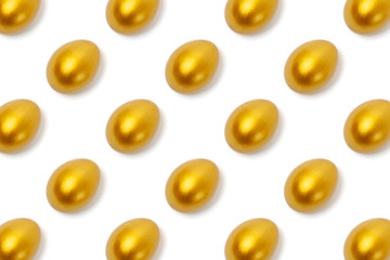 Fototapeta premium Pattern with golden eggs isolated on the white background. The concept of trend easter, wealth, luck, business, treasure, prosperity.