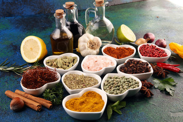 Spices and herbs on table. Food and cuisine ingredients with oil and vinegar