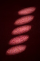  abstract red ovals on black background