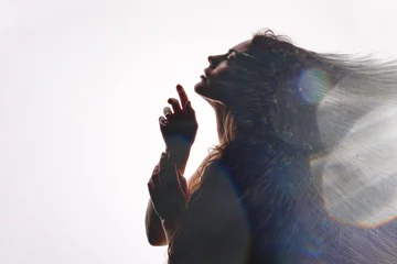 Double exposure of women face and galaxy. Abstract woman portrait on the white background. Free space for text. © kiy_lg