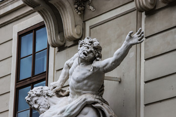 Obraz premium Sculpture of Hercules fighting Anteo at the Hofburg in Vienna, Austria.