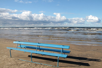  bench in the sand on the beach