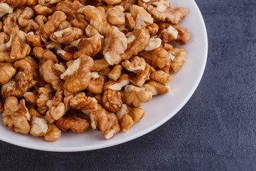 Walnuts shelled. Peeled Raw Walnuts. Fresh organic Nuts. Raw nuts. Many delicious Walnuts as a food background.